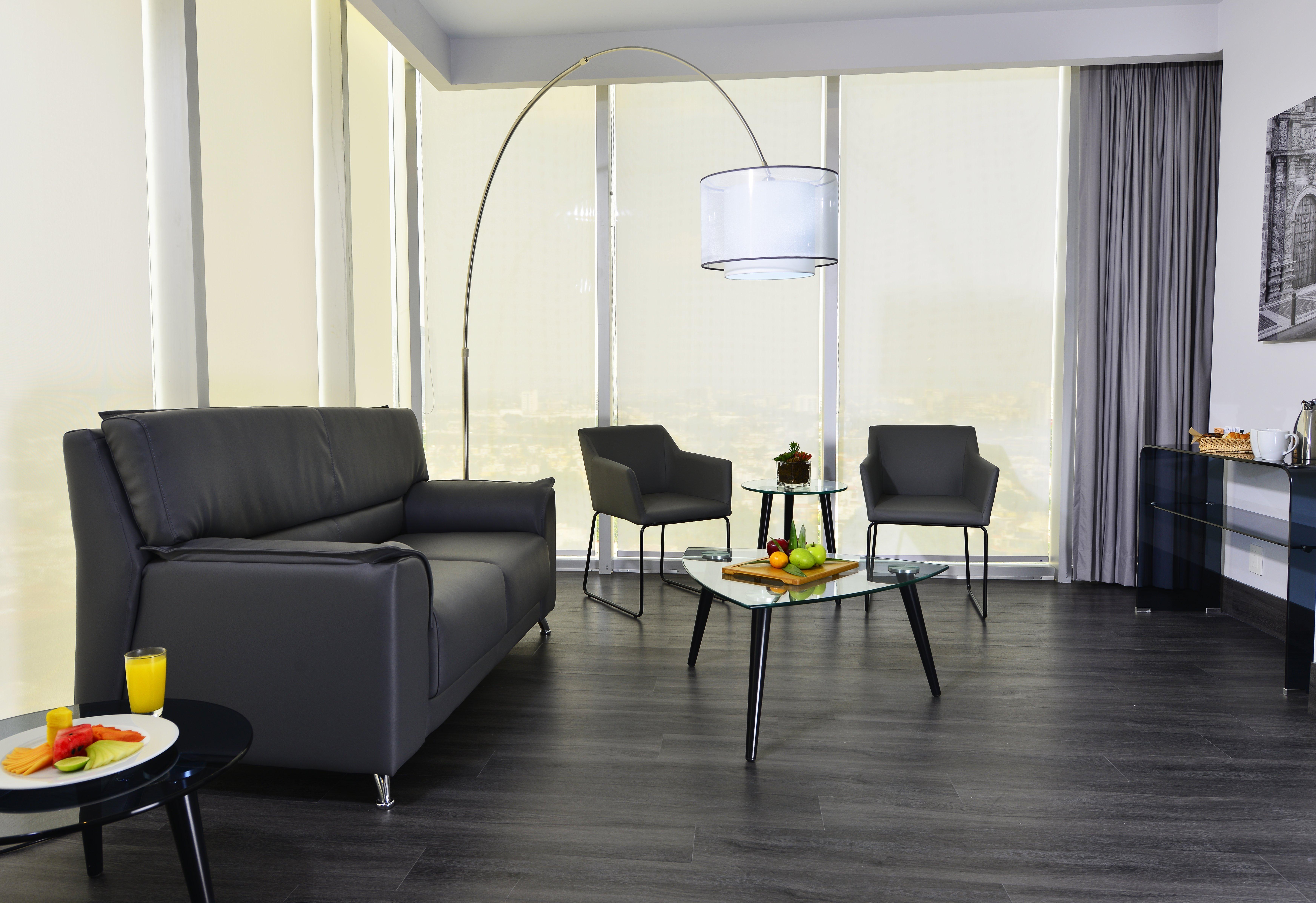Baruk Guadalajara Hotel De Autor Exteriör bild A living room with a floor lamp